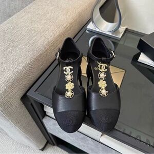 CHANEL Black Leather T-Strap Cap-Toe Flats with Gold CC Medallions